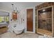 Stylish bathroom with a clawfoot tub, a tiled shower, and elegant fixtures at 1433 Kern Carlton Rd, Salisbury, NC 28146