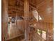 Hallway with wooden ceilings and walls, and a stone fireplace at 1433 Kern Carlton Rd, Salisbury, NC 28146