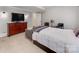 Cozy bedroom featuring neutral decor, a TV, and comfortable seating with a pull out bed at 1600 Princeton Ave, Charlotte, NC 28209