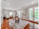 Inviting dining area with French doors, natural light, and elegant decor at 1600 Princeton Ave, Charlotte, NC 28209