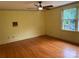 Bedroom boasting hardwood floors and an abundance of natural light from the large windows at 1614 Statesville Blvd, Salisbury, NC 28144