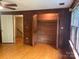 Bedroom featuring a closet with cedar walls, hardwood floors and natural light at 1614 Statesville Blvd, Salisbury, NC 28144