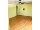 Bright bedroom with hardwood floors and neutral walls offering a versatile space at 1614 Statesville Blvd, Salisbury, NC 28144