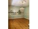 Traditional dining room featuring a vintage chandelier and hand-painted mural at 1614 Statesville Blvd, Salisbury, NC 28144