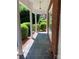 Covered front porch with brick facade, classic columns, and slate-look floor; great curb appeal at 1614 Statesville Blvd, Salisbury, NC 28144
