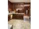 This home has a kitchen featuring lots of wood cabinets and breakfast bar at 1614 Statesville Blvd, Salisbury, NC 28144