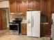A kitchen featuring stainless steel appliances and ample cabinetry with wood finish at 1614 Statesville Blvd, Salisbury, NC 28144