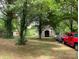 Exterior of a barn with a red truck on a large lot at 1614 Statesville Blvd, Salisbury, NC 28144