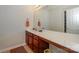 Bathroom with a large vanity, sink, and expansive mirror at 166 Glenn Allen Rd, Mooresville, NC 28115