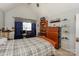 Cozy bedroom featuring a vaulted ceiling and a collection display shelf at 166 Glenn Allen Rd, Mooresville, NC 28115