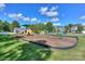 Community playground with slides, swings, and play structures set in a park-like environment for Gathering fun at 166 Glenn Allen Rd, Mooresville, NC 28115