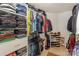 Organized walk-in closet featuring custom shelving and storage solutions for clothing and accessories at 166 Glenn Allen Rd, Mooresville, NC 28115