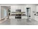 Modern kitchen features stainless steel appliances, granite countertops and a view into an adjacent room at 1730 Eden Glen Dr, Dallas, NC 28034