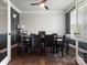 Cozy game room with hardwood floors, a ceiling fan, and a poker table surrounded by comfortable chairs at 1810 Kerwick Ct, Lancaster, SC 29720