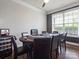 Well-appointed game room boasts hardwood floors, a poker table, and ample seating for entertaining guests at 1810 Kerwick Ct, Lancaster, SC 29720