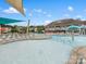 A large swimming pool is surrounded by lounge chairs and shade structures at 1810 Kerwick Ct, Lancaster, SC 29720