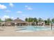 A community swimming pool has a splash area and an adjacent clubhouse at 1810 Kerwick Ct, Lancaster, SC 29720