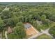 Scenic aerial shot of a home on a treed lot in a friendly neighborhood, blending nature and community at 209 Stafford Estates Dr, Salisbury, NC 28146