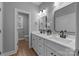 Stylish bathroom with double vanity, quartz countertops, modern fixtures and neutral paint at 209 Stafford Estates Dr, Salisbury, NC 28146