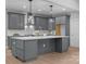 This kitchen offers an island with gray cabinets, stainless steel appliances, and modern lighting at 209 Stafford Estates Dr, Salisbury, NC 28146