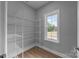 Well-lit pantry featuring sturdy metal shelving, offering ample storage and organization space at 209 Stafford Estates Dr, Salisbury, NC 28146