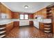 Classic kitchen features ample cabinet space, vintage appliances, and a functional layout at 220 Parker Ave, Mooresville, NC 28115