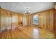Inviting living room showcasing original wood finishes and hardwood flooring at 220 Parker Ave, Mooresville, NC 28115