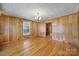 Traditional living room with wood accents, vintage charm, and hardwood flooring at 220 Parker Ave, Mooresville, NC 28115