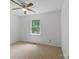Well-lit bedroom with a ceiling fan and a bright window view at 2223 Pacer Rd, Lancaster, SC 29720