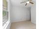 Bright bedroom with a ceiling fan and a large window at 2223 Pacer Rd, Lancaster, SC 29720