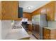 Modern kitchen features stainless steel appliances and ample cabinet space at 2223 Pacer Rd, Lancaster, SC 29720