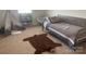 Bright bedroom featuring a twin bed, decorative teepee, and unique bear rug, creating a playful and inviting space at 2411 Bonterra Blvd, Indian Trail, NC 28079