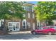 Beautiful brick townhome with lush trees, commercial space, and street parking at 2411 Bonterra Blvd, Indian Trail, NC 28079