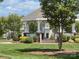 Charming community gazebo in a beautiful park setting with manicured lawn and blooming bushes at 2411 Bonterra Blvd, Indian Trail, NC 28079