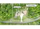 This aerial view showcases the house and detached garage at 2949 Anderson Burgess Rd, Sharon, SC, set amongst beautiful trees at 2949 Anderson Burgess Rd, Sharon, SC 29742