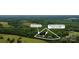 This aerial view showcases the homes and detached garage surrounded by lush, green trees at 2949 Anderson Burgess Rd, Sharon, SC at 2949 Anderson Burgess Rd, Sharon, SC 29742
