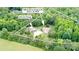 Aerial view of 2949 Anderson Burgess Rd, Sharon, SC, showing the homes and detached garage on a wooded lot at 2949 Anderson Burgess Rd, Sharon, SC 29742