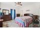Bedroom featuring a queen-sized bed, two dressers, a ceiling fan, and natural light at 2949 Anderson Burgess Rd, Sharon, SC 29742