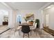 Bright, staged dining room featuring modern furniture, neutral decor, and natural light for elegant meals at 2949 Anderson Burgess Rd, Sharon, SC 29742