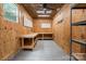 This garage's plywood walls and workbench offer both function and utility with plenty of space to make projects possible at 2949 Anderson Burgess Rd, Sharon, SC 29742