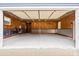 This large garage boasts wood walls, metallic accents, and bright lighting, making it an ideal space for any project at 2949 Anderson Burgess Rd, Sharon, SC 29742