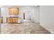 Open kitchen/dining area with warm wood cabinets, durable floors, and a functional layout, perfect for everyday living at 2949 Anderson Burgess Rd, Sharon, SC 29742