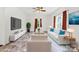 Bright, staged living room featuring modern furniture, a large TV, and neutral decor for a comfortable ambiance at 2949 Anderson Burgess Rd, Sharon, SC 29742