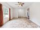 Empty living room with neutral walls, large windows, and tile flooring ready to be customized to your style at 2949 Anderson Burgess Rd, Sharon, SC 29742