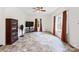 Empty living room with neutral walls, large windows, and tile flooring ready to be customized to your style at 2949 Anderson Burgess Rd, Sharon, SC 29742