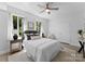 Cozy bedroom with natural light, neutral colors, and closet for storage at 300 W Fifth St # 509, Charlotte, NC 28202