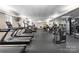 A well-equipped fitness center with treadmills, weights, and various exercise machines for resident use at 300 W Fifth St # 509, Charlotte, NC 28202