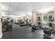 Well-equipped gym featuring modern machines, treadmills, ellipticals, and weight training equipment at 300 W Fifth St # 509, Charlotte, NC 28202