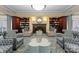 Elegant lounge area with fireplace, built-in bookshelves, and comfortable seating for relaxation at 300 W Fifth St # 509, Charlotte, NC 28202