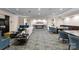 Spacious recreation room with comfortable seating, game tables, and stylish decor for community enjoyment at 300 W Fifth St # 509, Charlotte, NC 28202